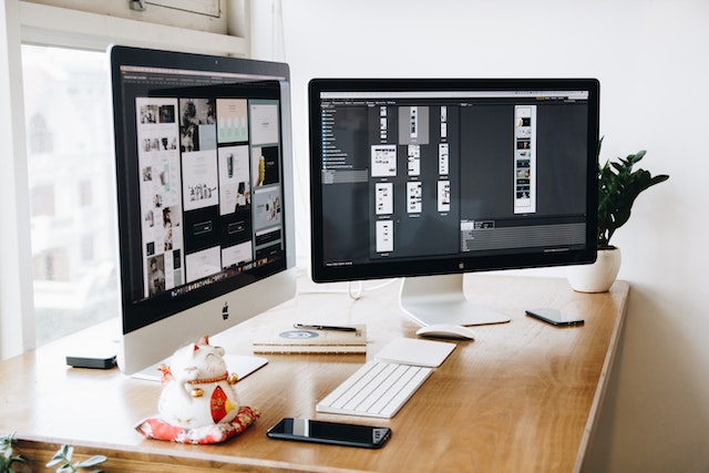 workstation with dual monitors for website design work